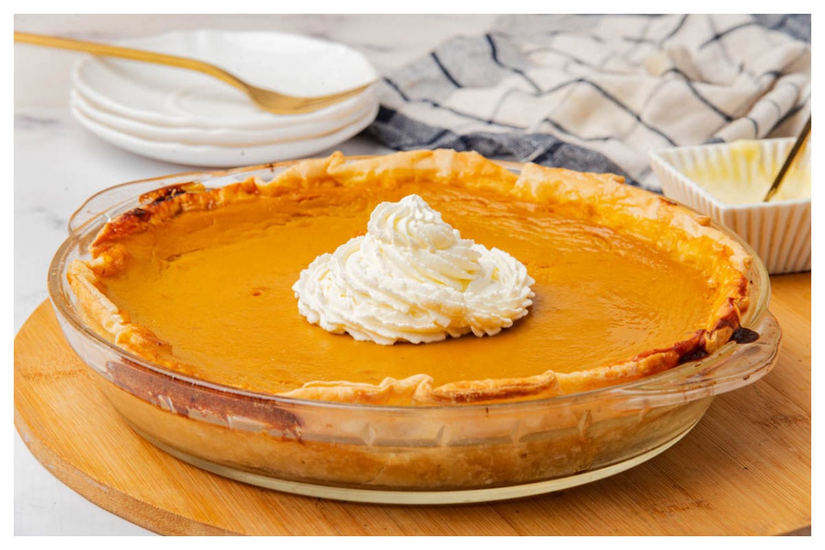 Sweet Potato Pie with whipped cream in center.