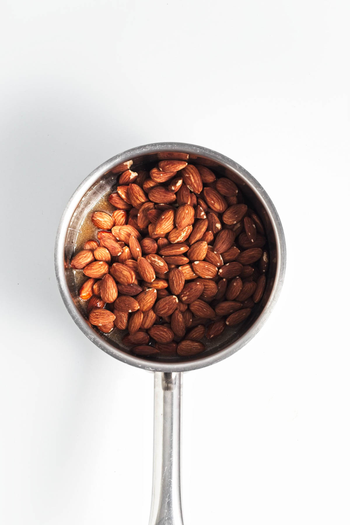 Almonds in a saucepan.