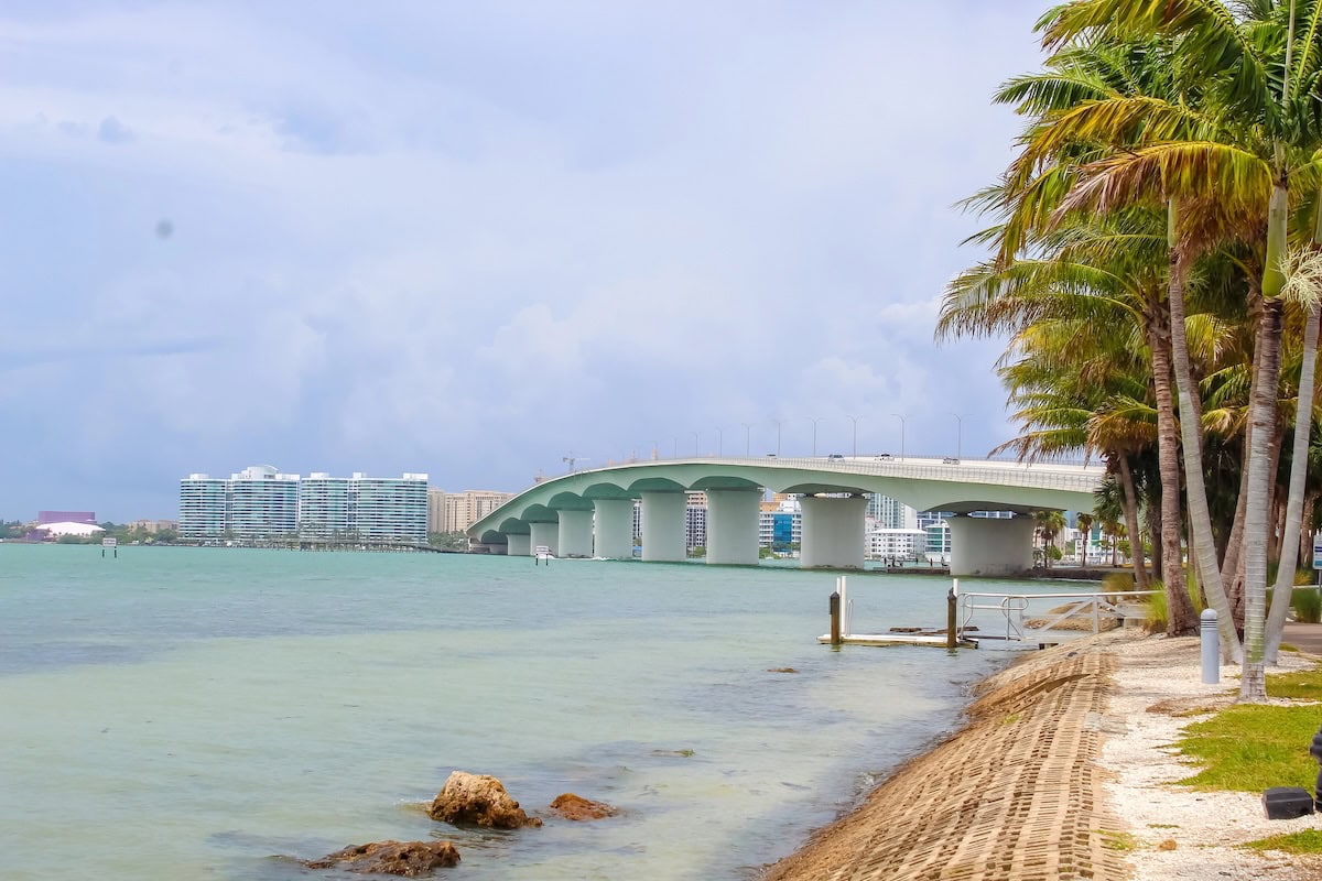 Bridge over Sarasota Bay with tall buildings on the other side.