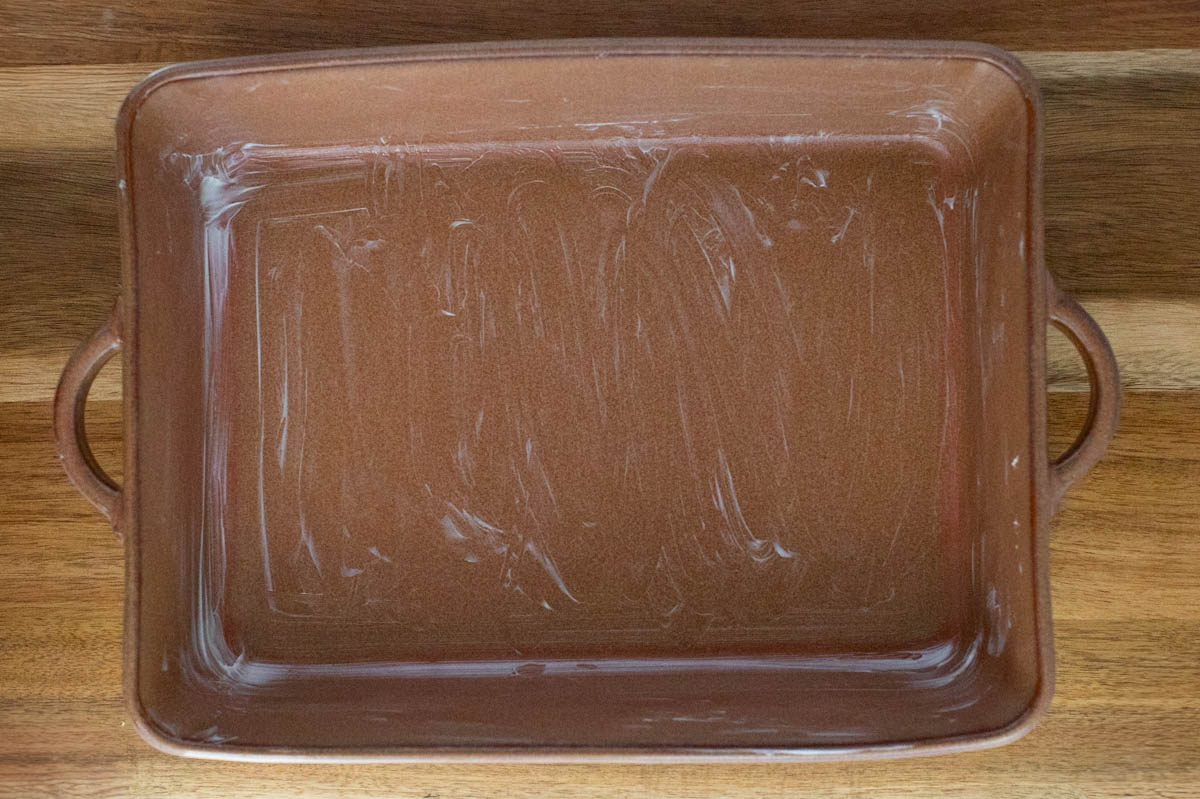 Baking dish greased with butter.