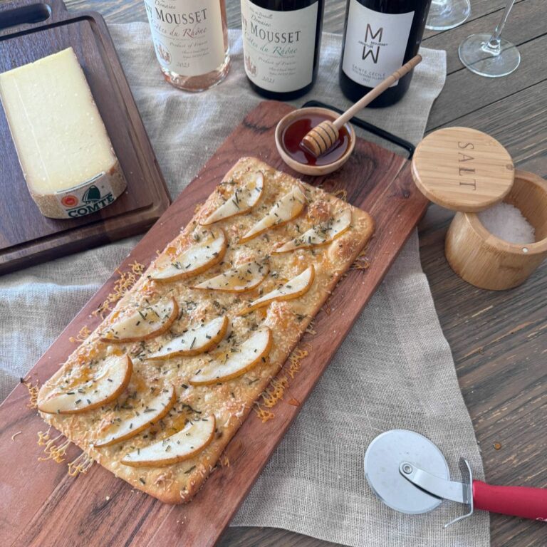A table with a tray with a pie on it