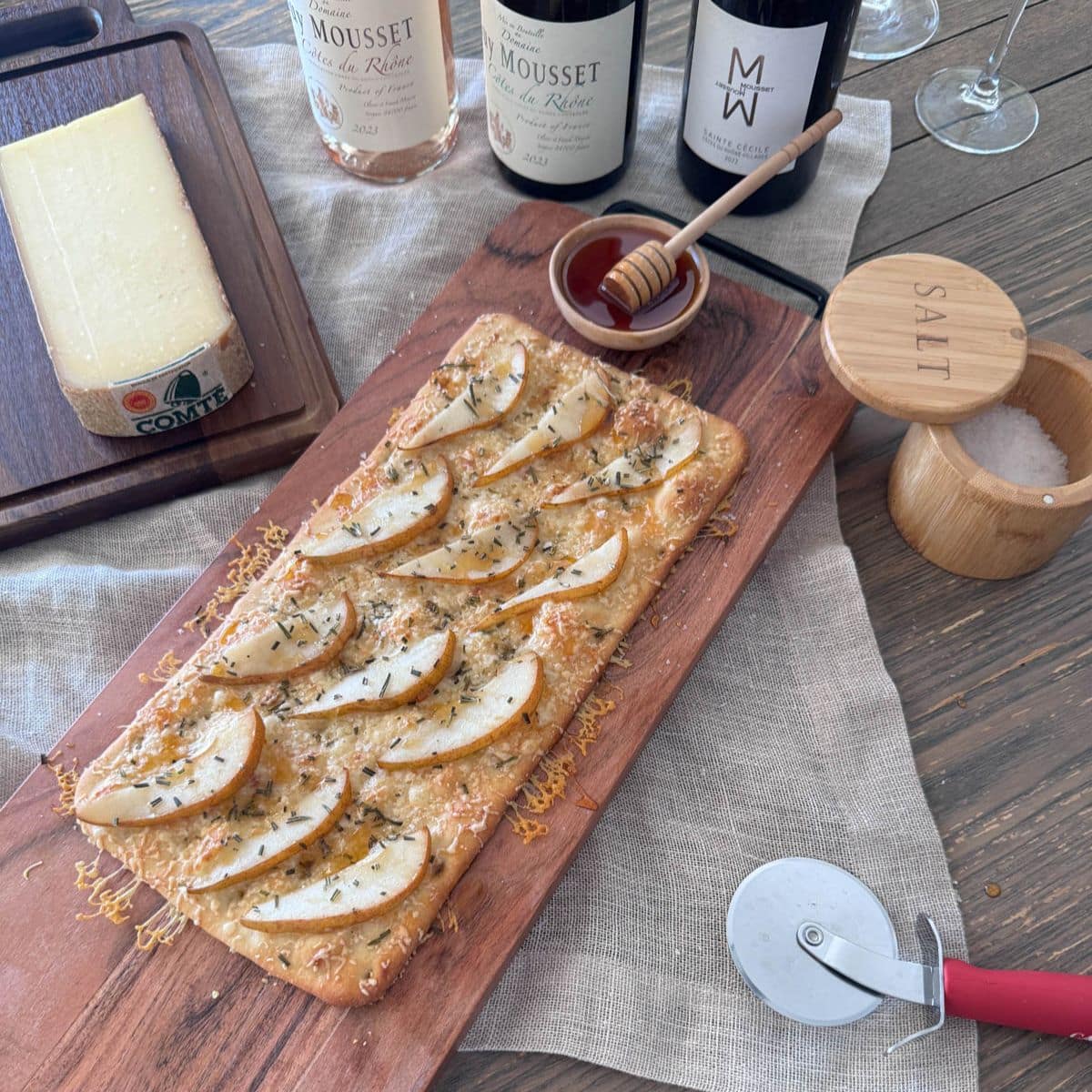 A table with a tray with a pie on it