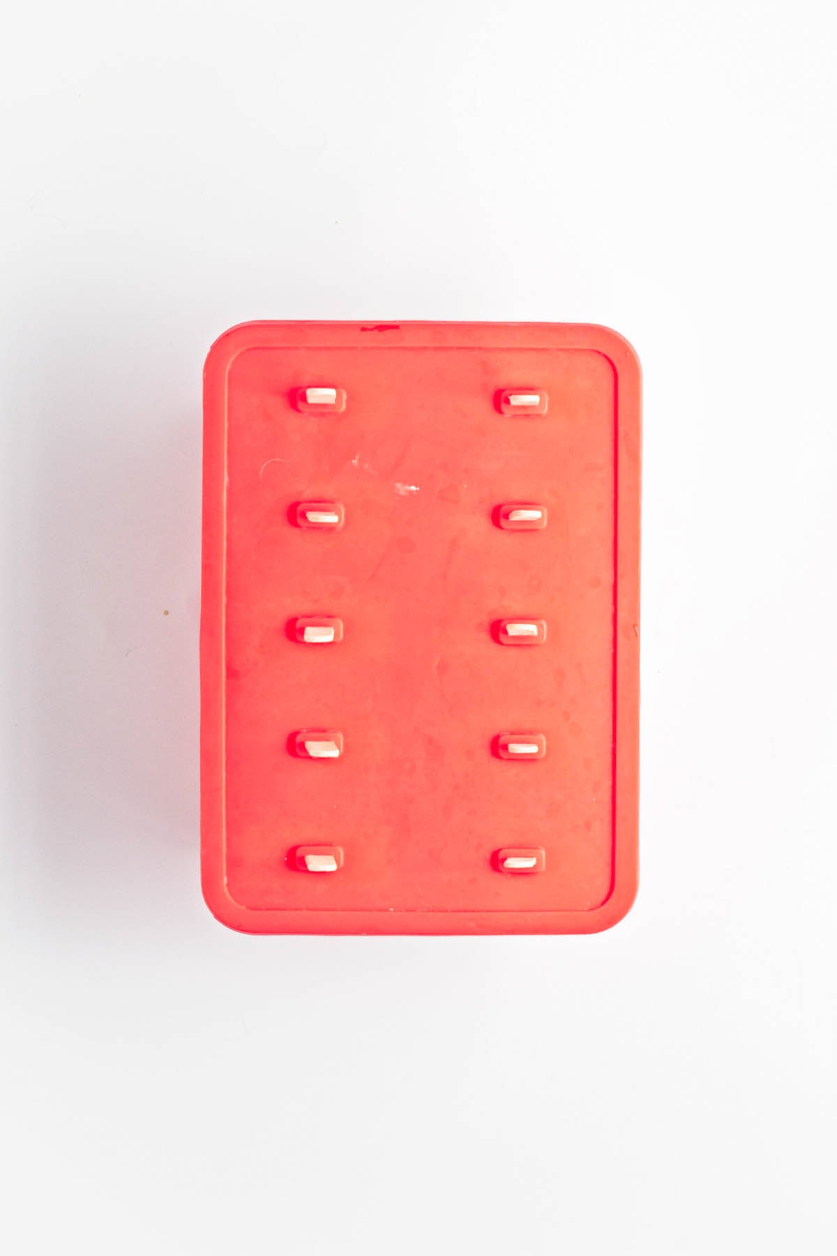 Lid on popsicle mold.