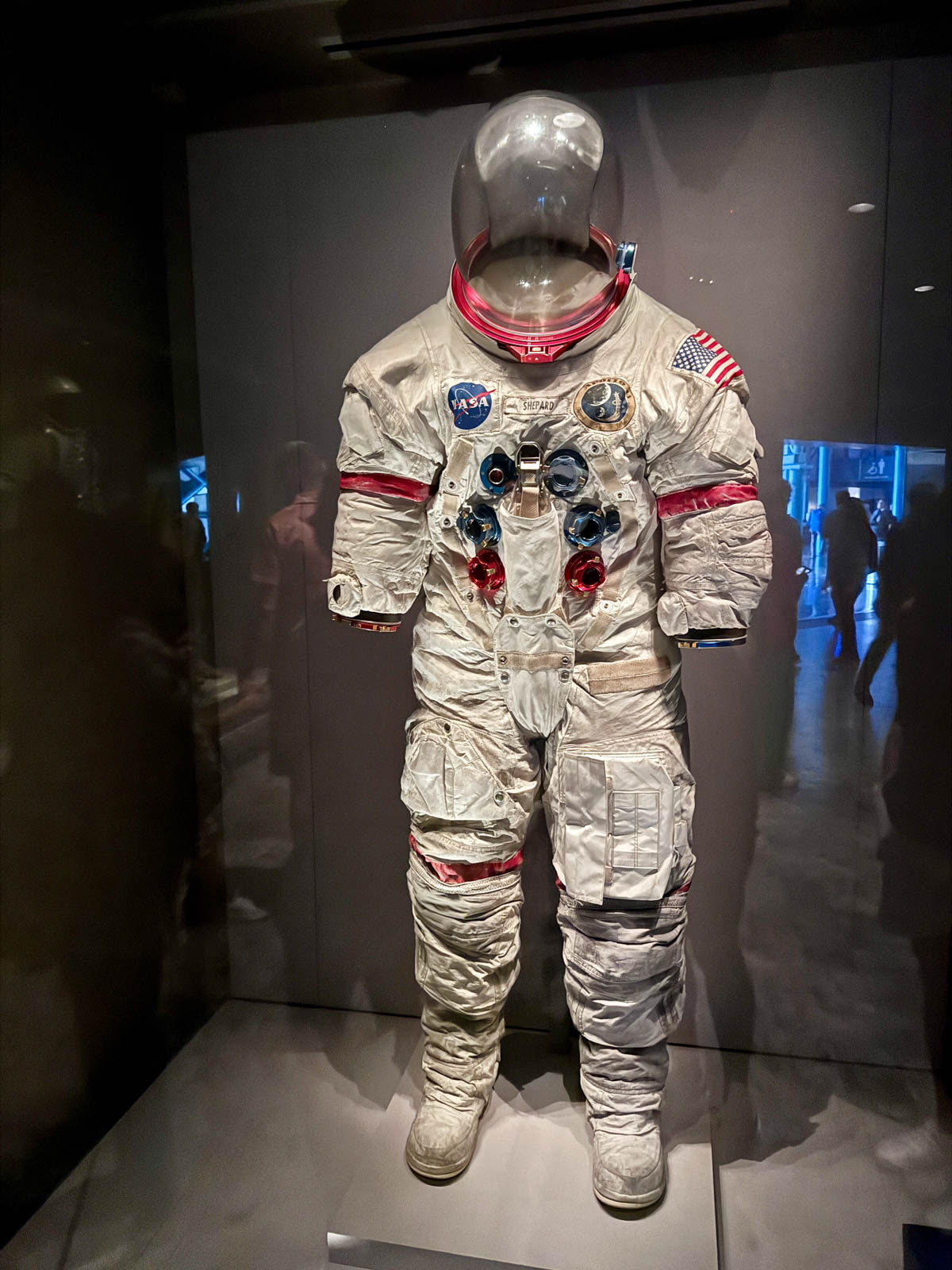 Astronaut suit in glass case.