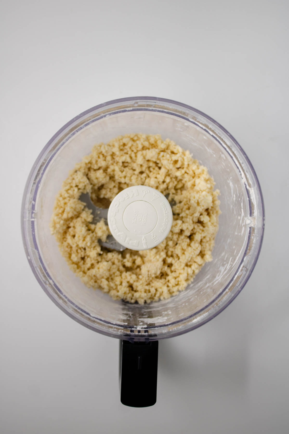 Butter, flour, salt, and water in food processor to make dough.