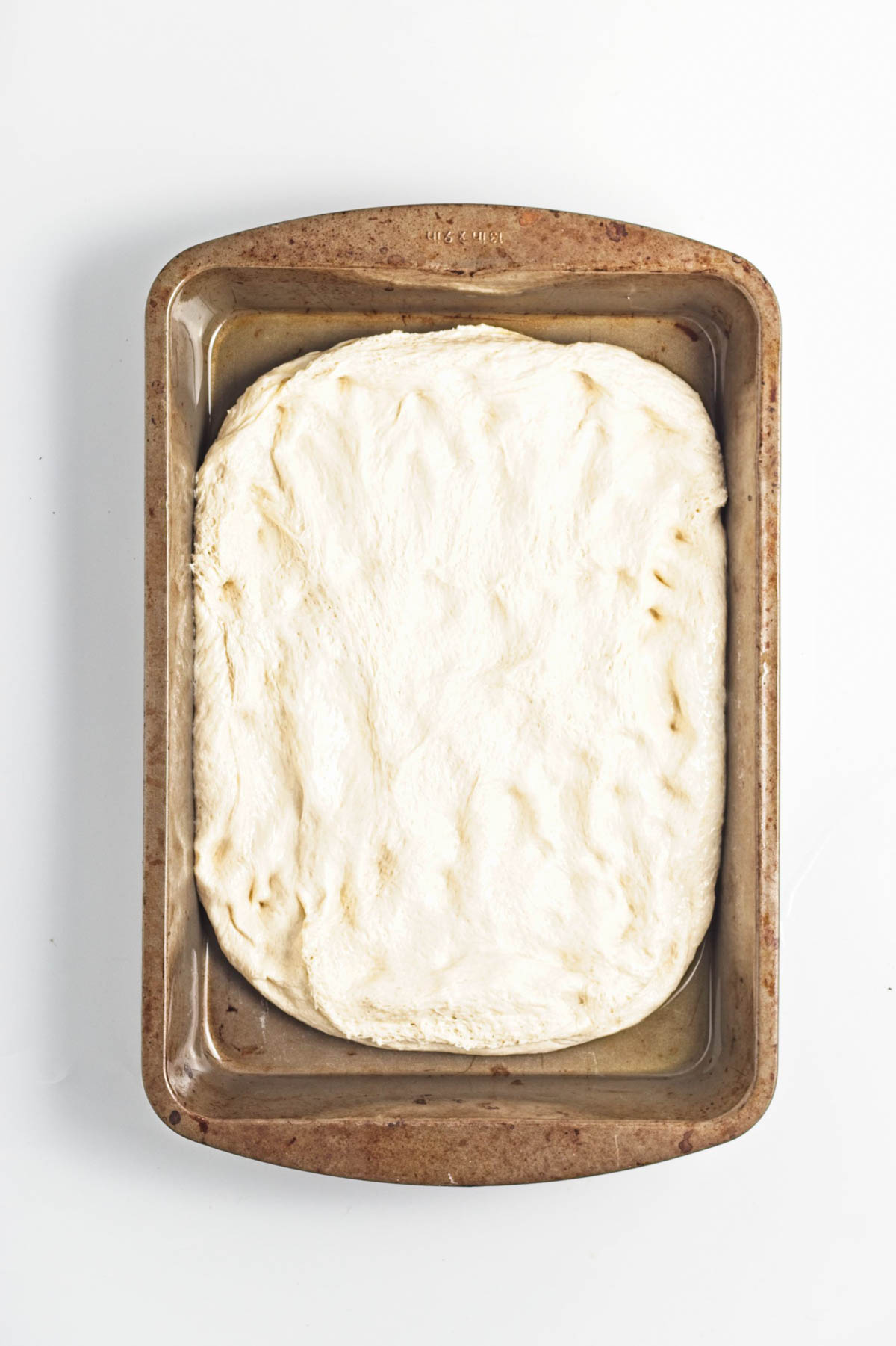 Dough in a baking pan.