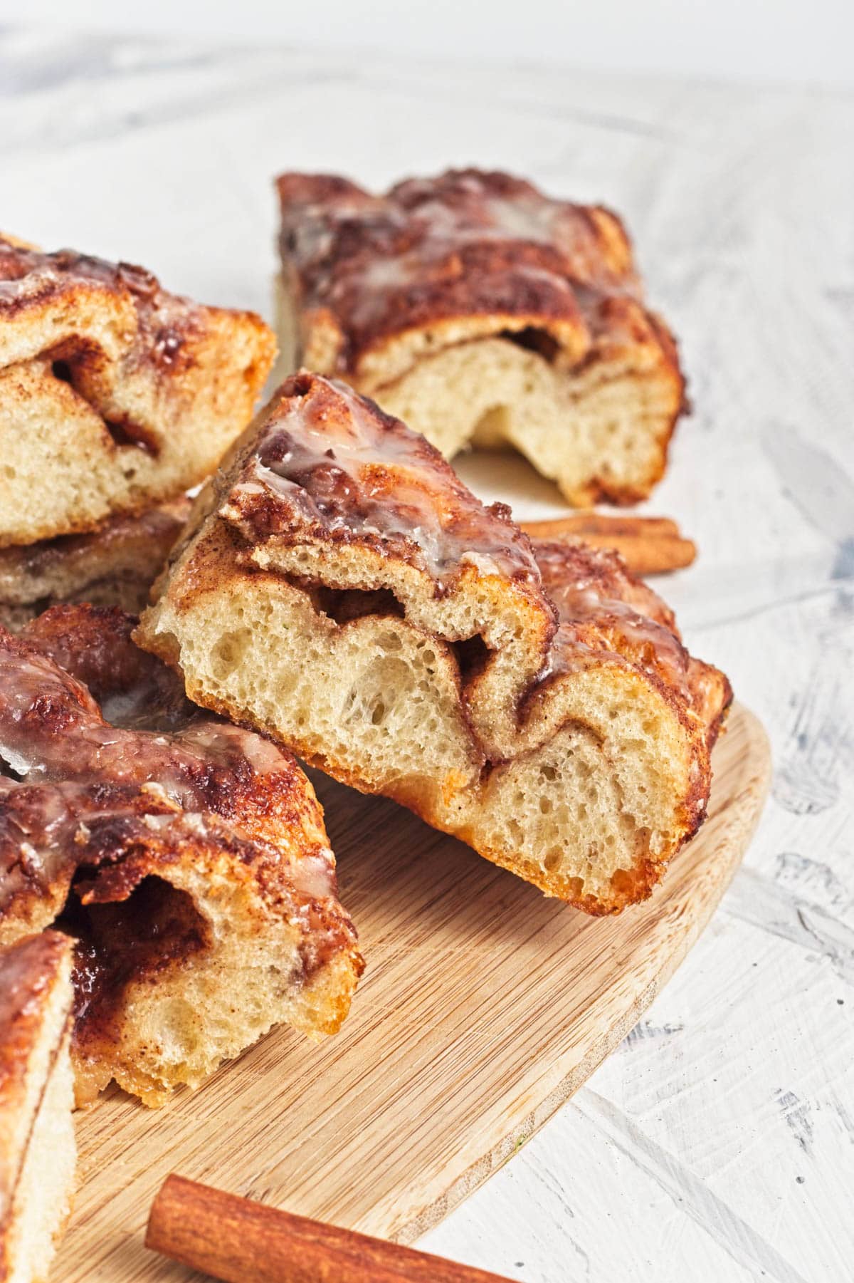 Cinnamon focaccia bread with icing on top.