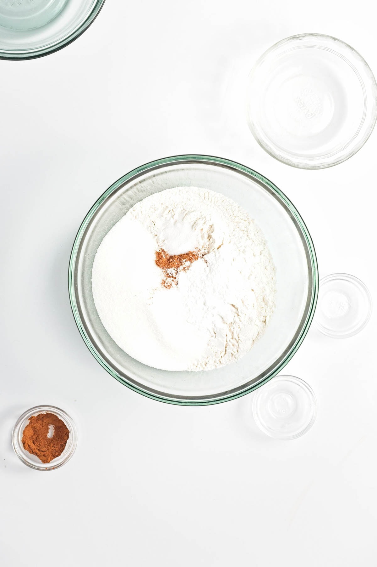 Flour, baking powder, sugar, and cinnamon.