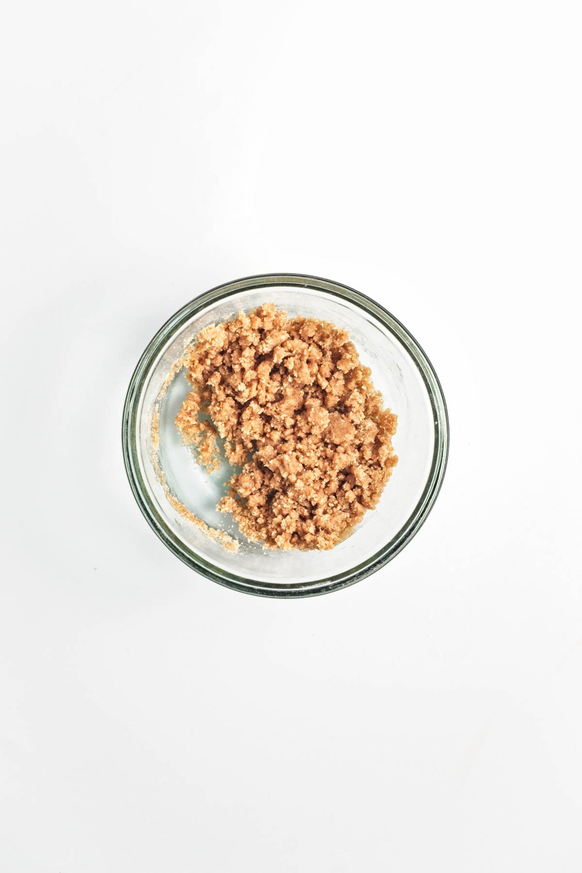 Streusel topping on a glass bowl.