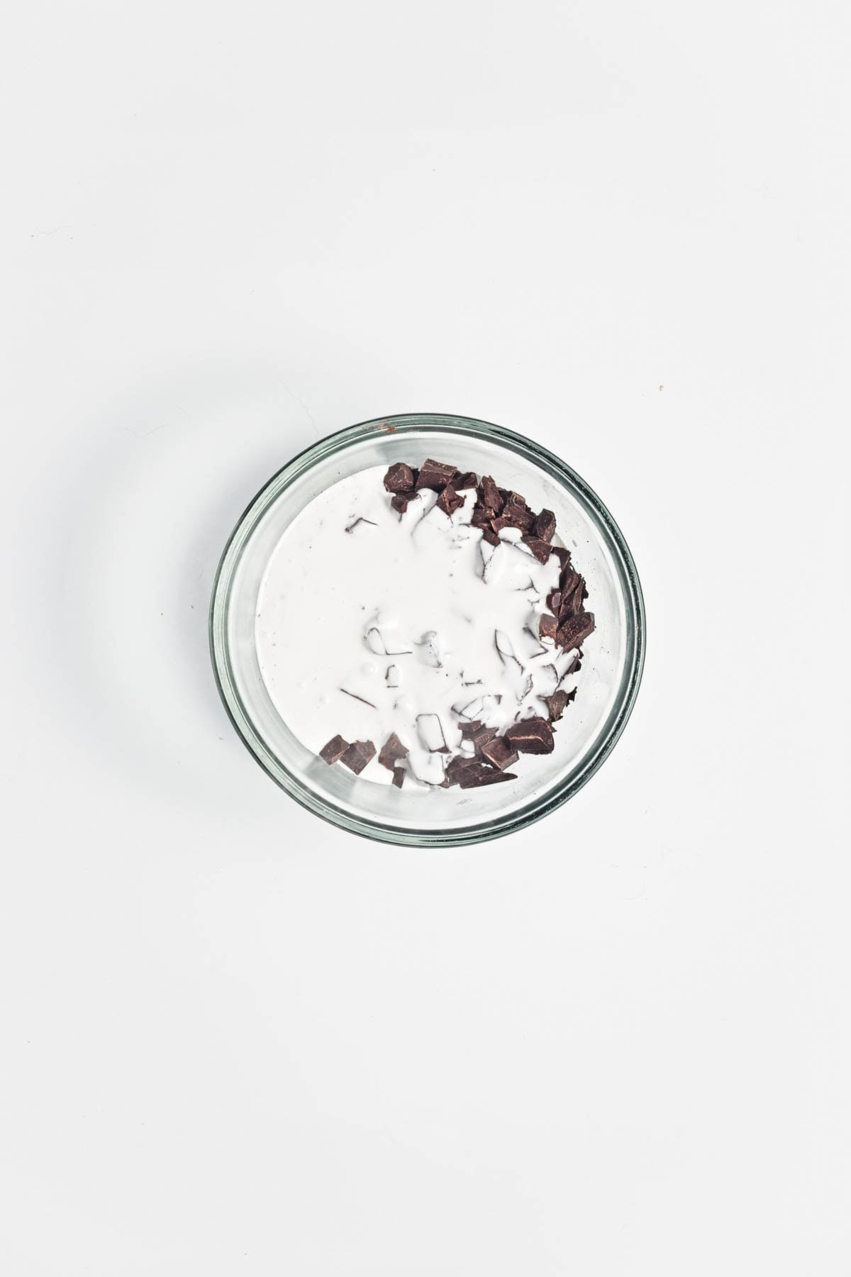 Chocolate and coconut cream in a glass bowl.