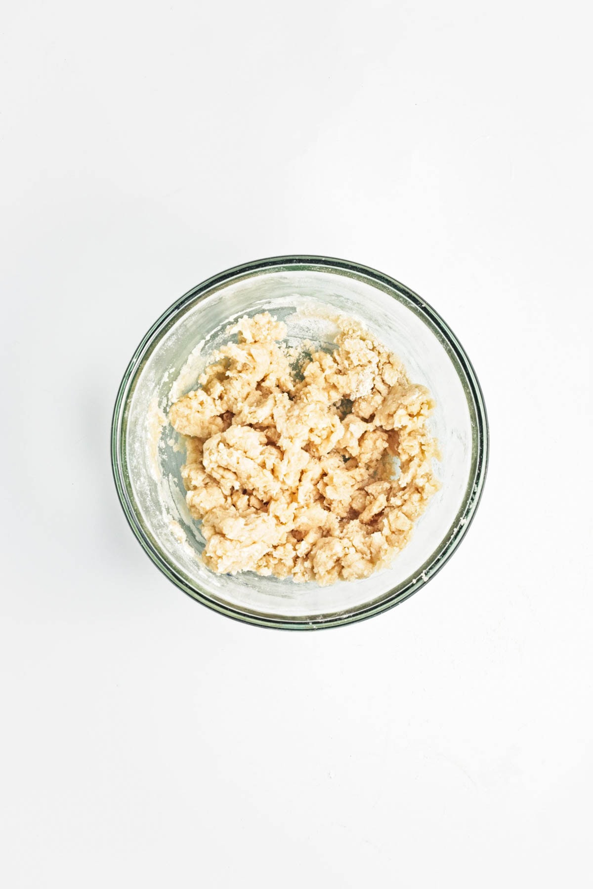 Cake mix with water and oil combined in a glass bowl