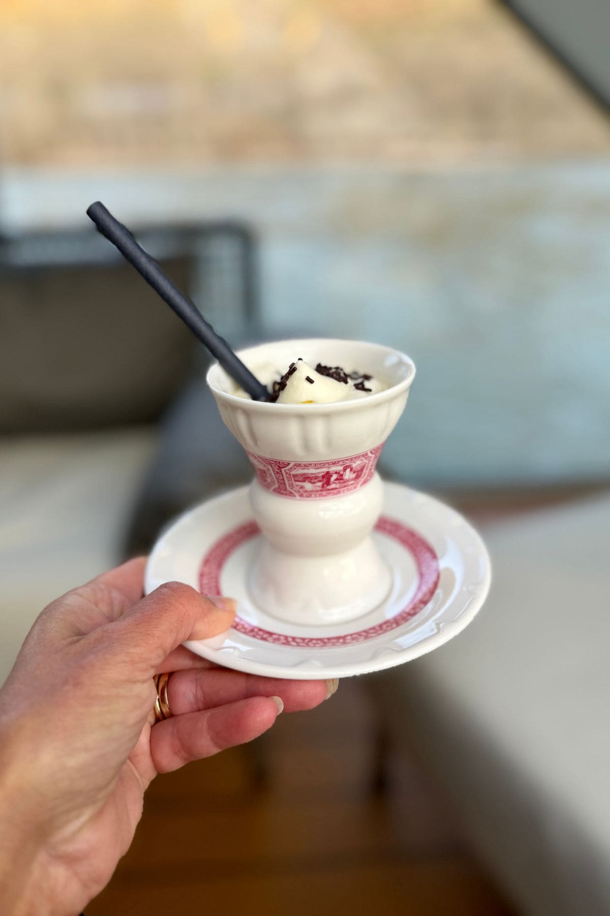 Traditional hot drink in Germany in a white and red cup.