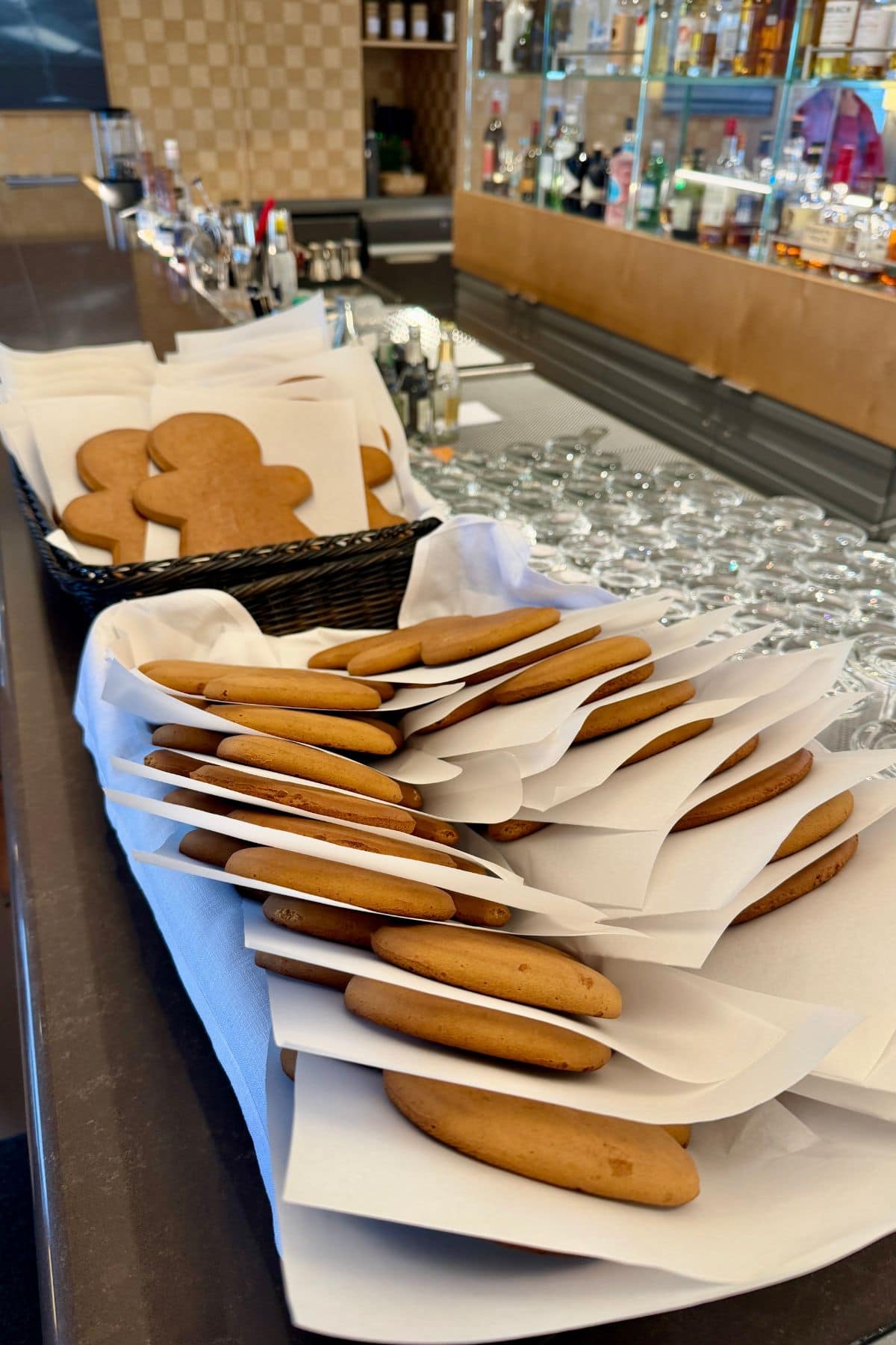Gingerbread men cookies on white paper.