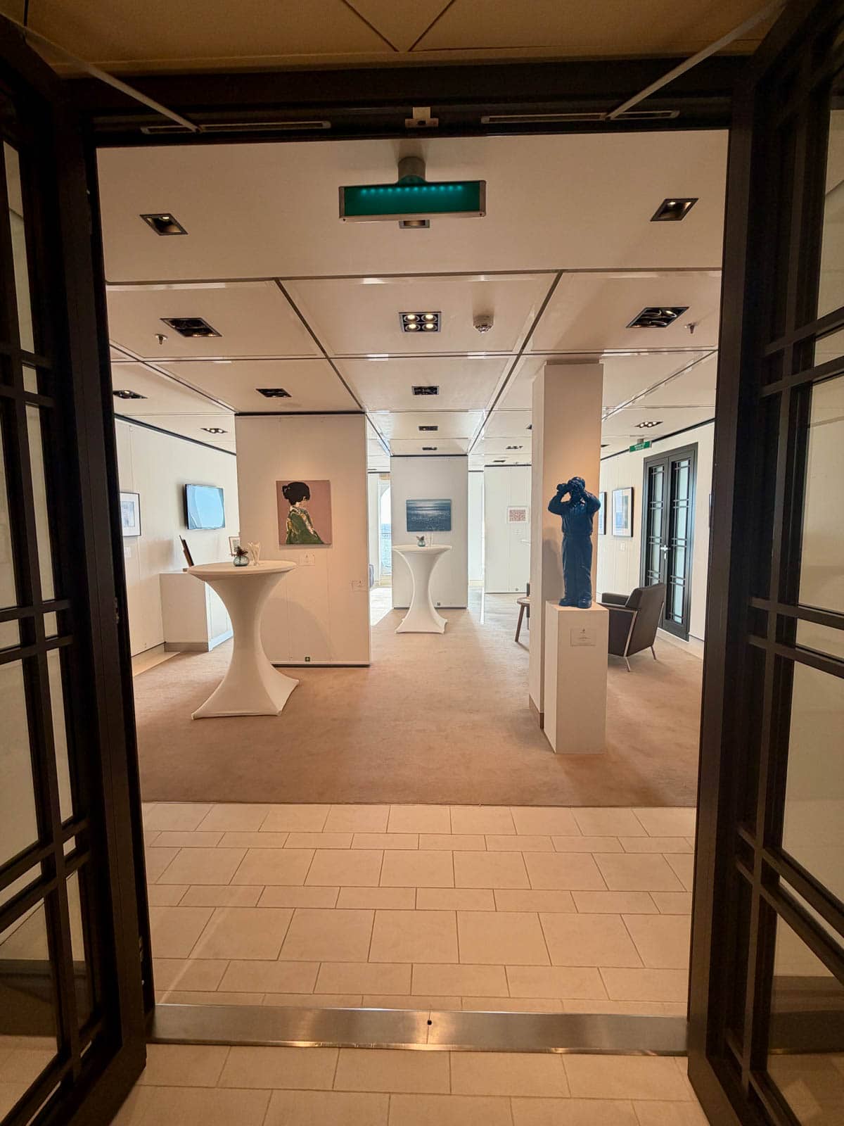 Looking into the art gallery on a cruise ship.
