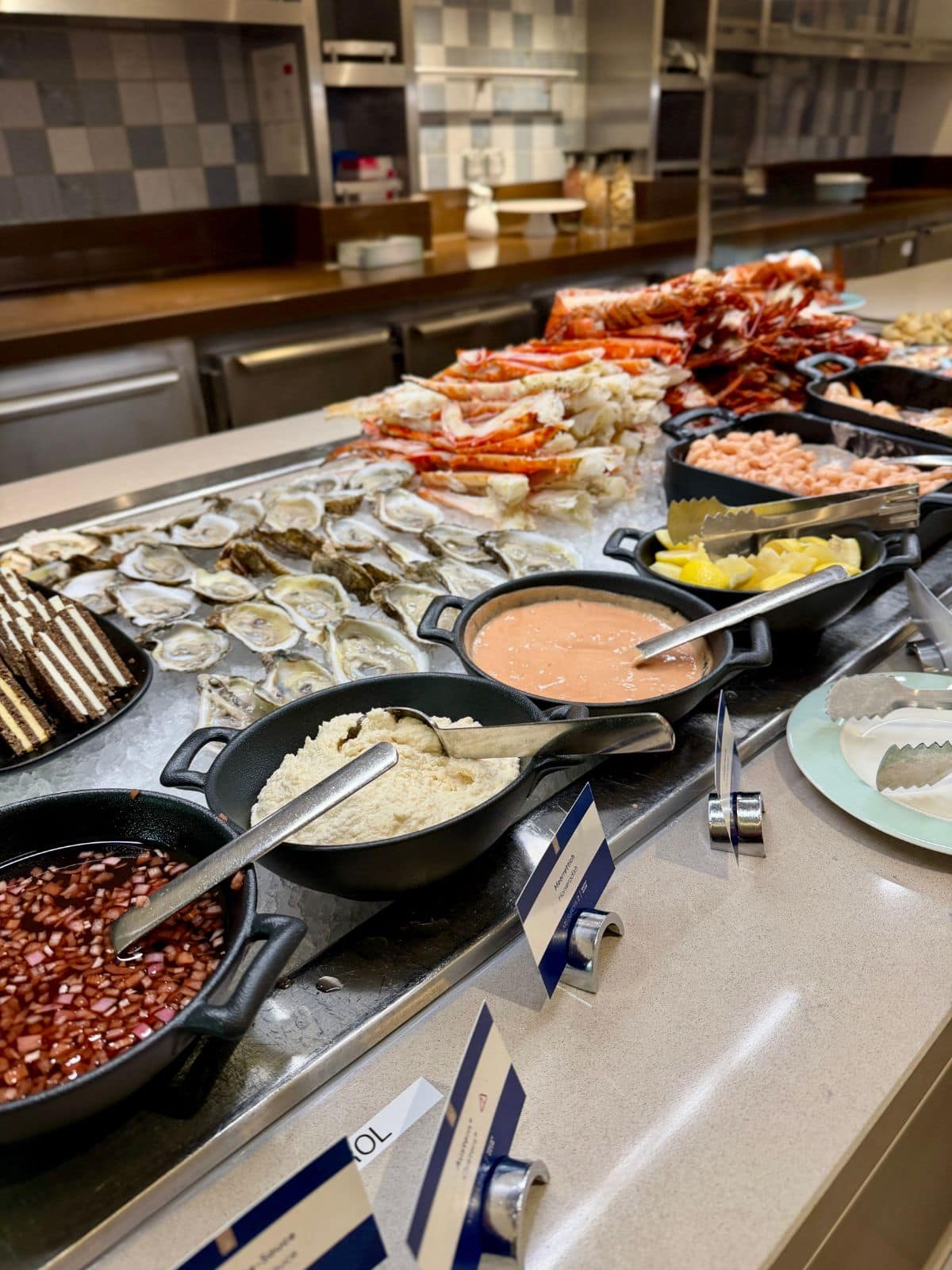 Seafood and sauces on buffet on cruise ship.