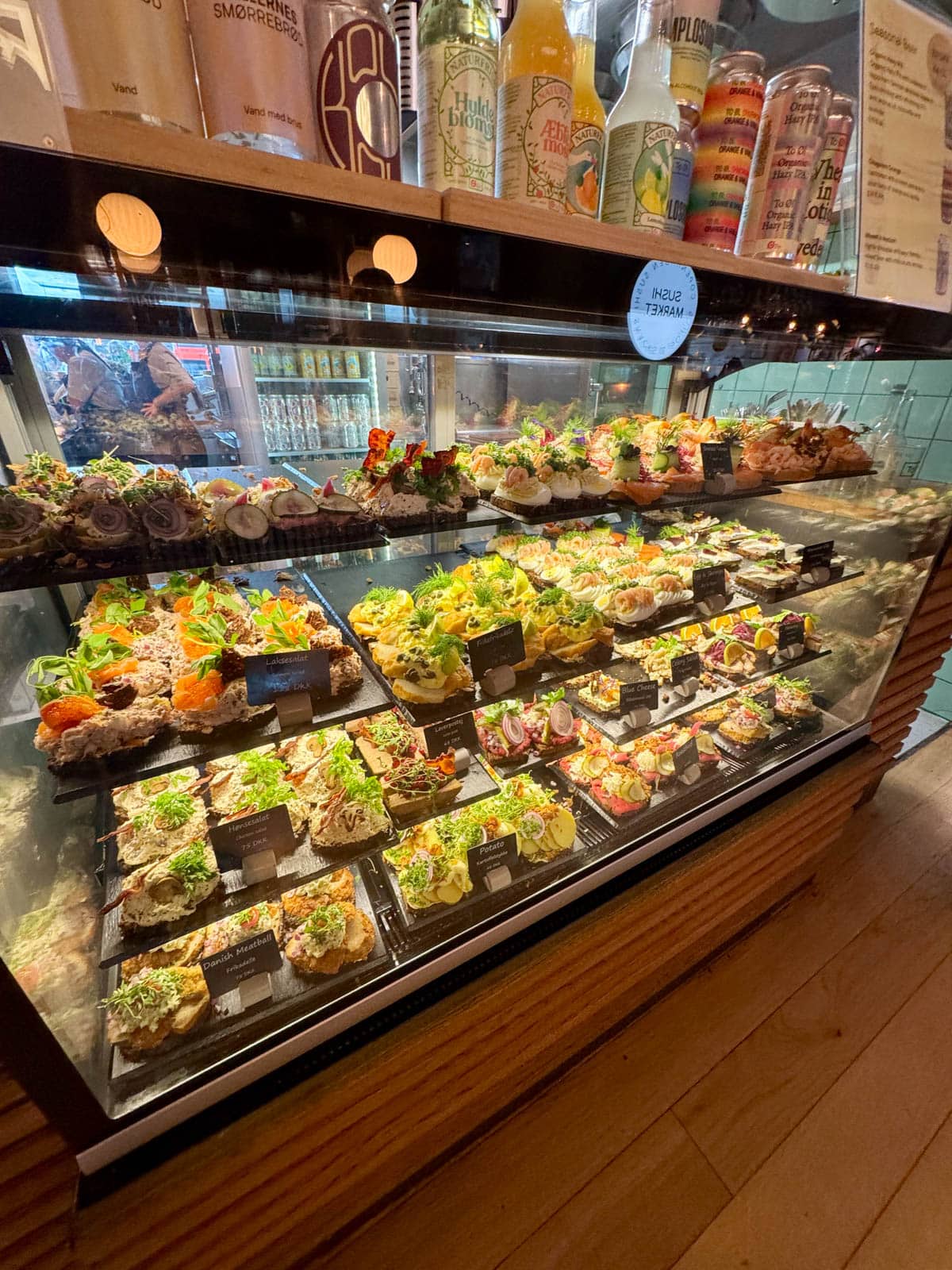 Food case showing all kinds of Danish small bites.