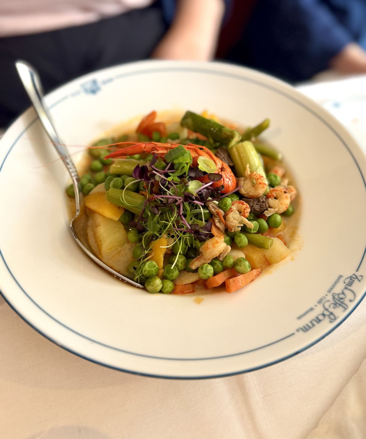 crayfish, morels, and bread dumplings along with various baby vegetables like carrots, kohlrabi, asparagus and cauliflower