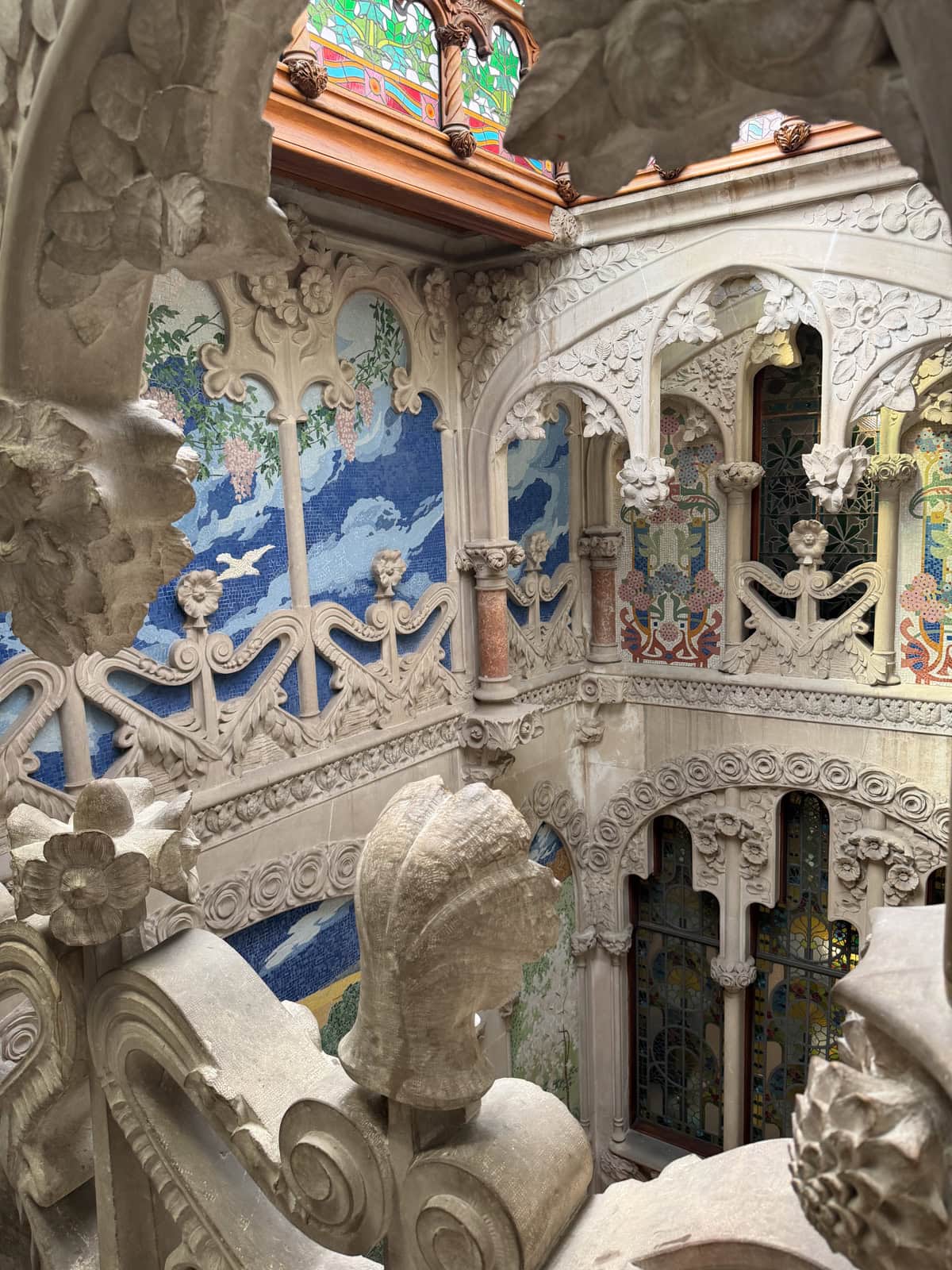 Inside a Modernist building with elaborate architecture and decor.