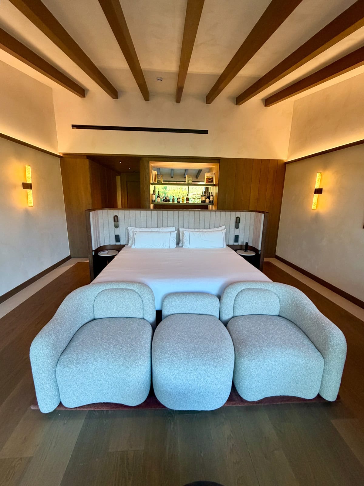 Large bed in an upscale hotel room.