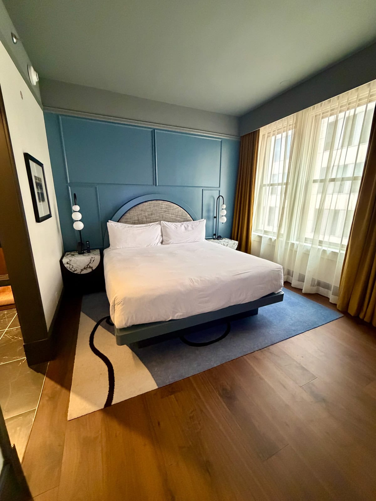 Bed in hotel room.