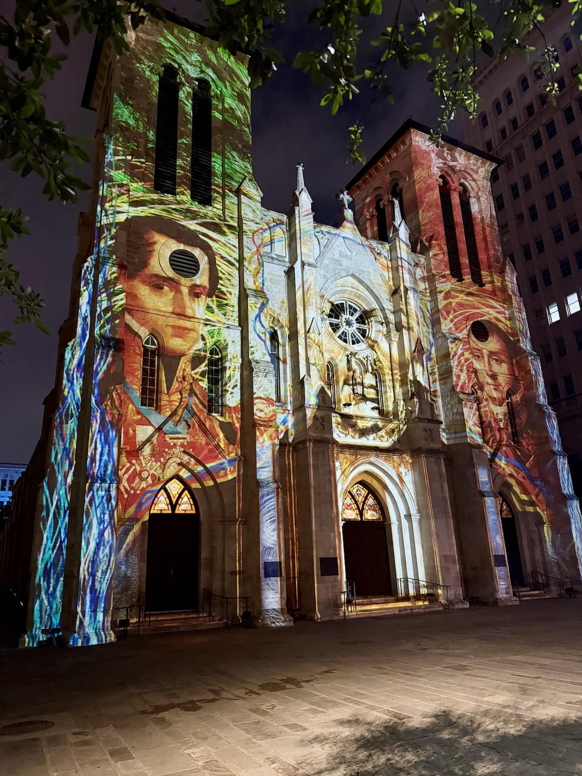 Old church with visual light show on facade.